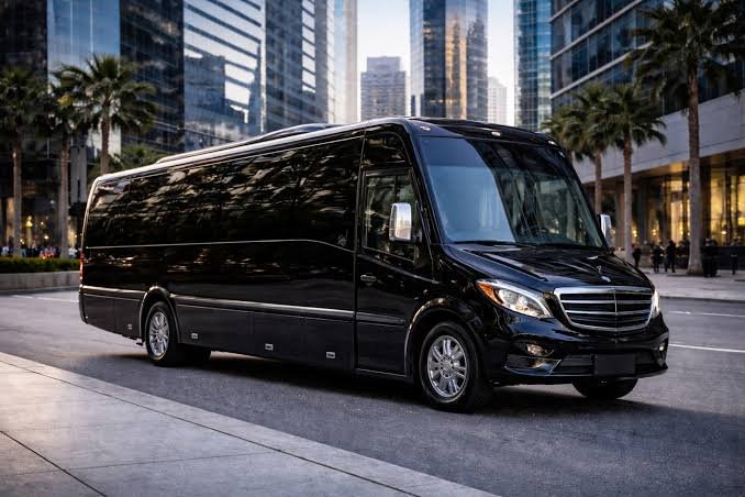 What should be included in a group transportation contract for a Boston event?